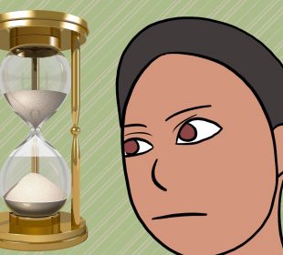 A person staring at an hourglass.