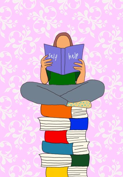 A person reading a self-help book, sitting on top of a pile of other books